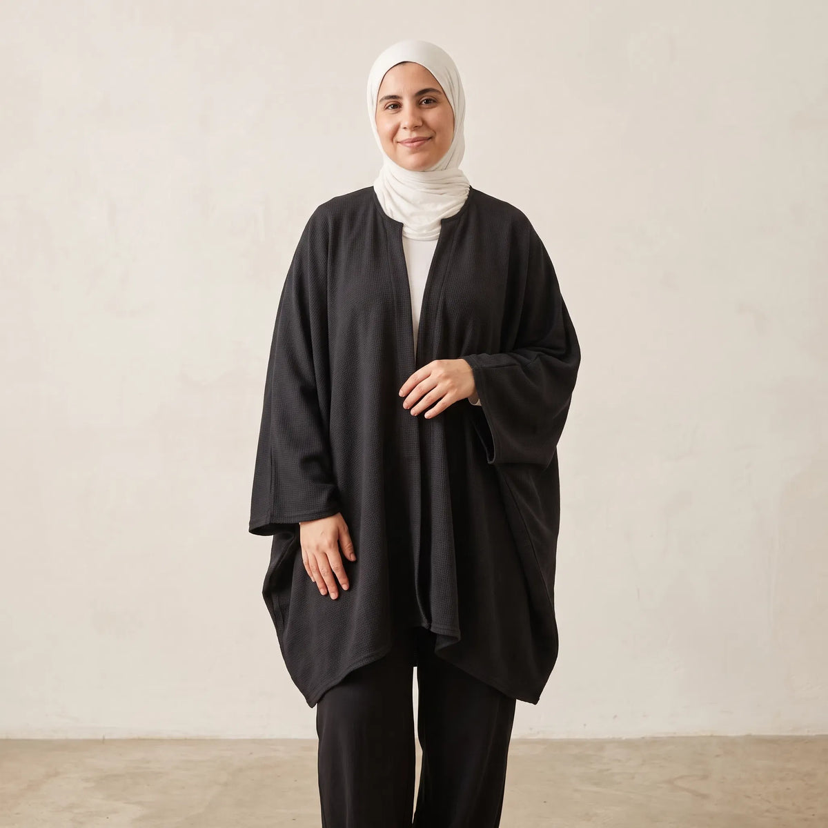Cocoon Poncho | بونشو كوكـون 🤍